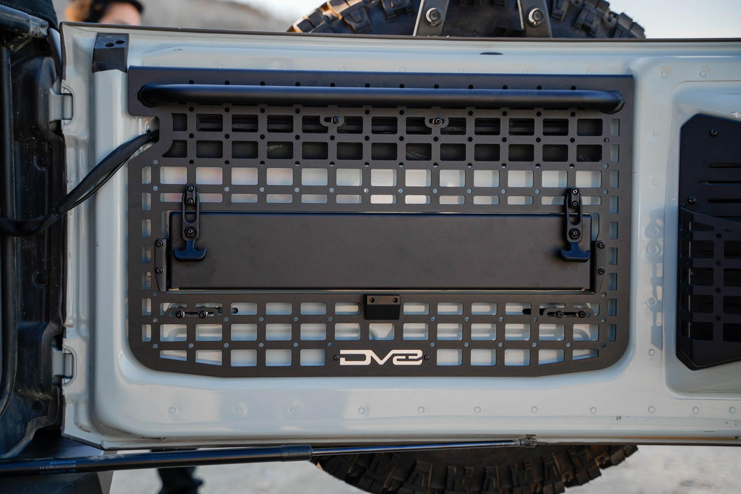 DV8 Offroad Tailgate Molle Panel for The 2021-2026 Ford Bronco | Perfect for Molle Bags, Knife Sheaths, Med Kits, Recovery Gear & More | Drop-Down Tray for Holding Drinks & Other Gear While at Camp