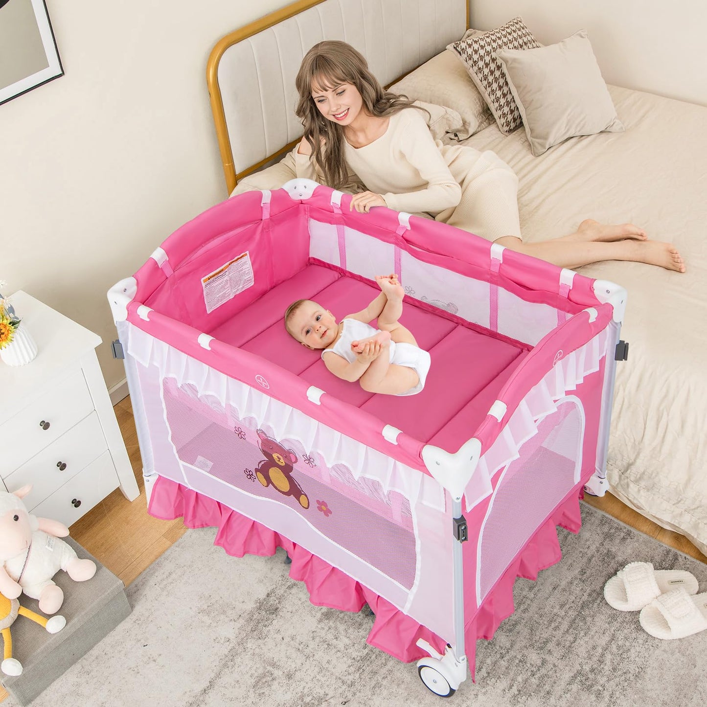 HONEY JOY 4-in-1 Pack and Play with Canopy, Portable Baby Playard w/Changing Table and Infant Bassinet, Cute Toys & Music, Foldable Bassinet for Newborn and Toddler (Hot Pink)